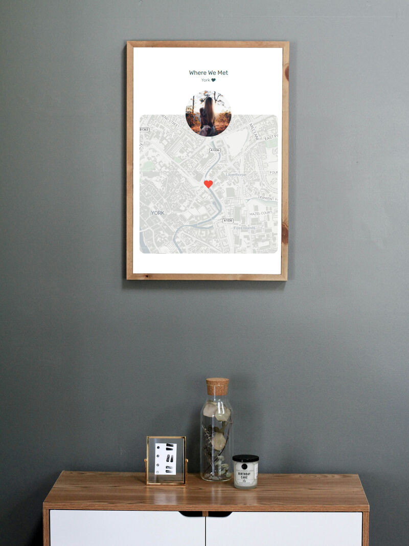 Tall slender porcelain bottle with natural clay textured body and cork stopper.